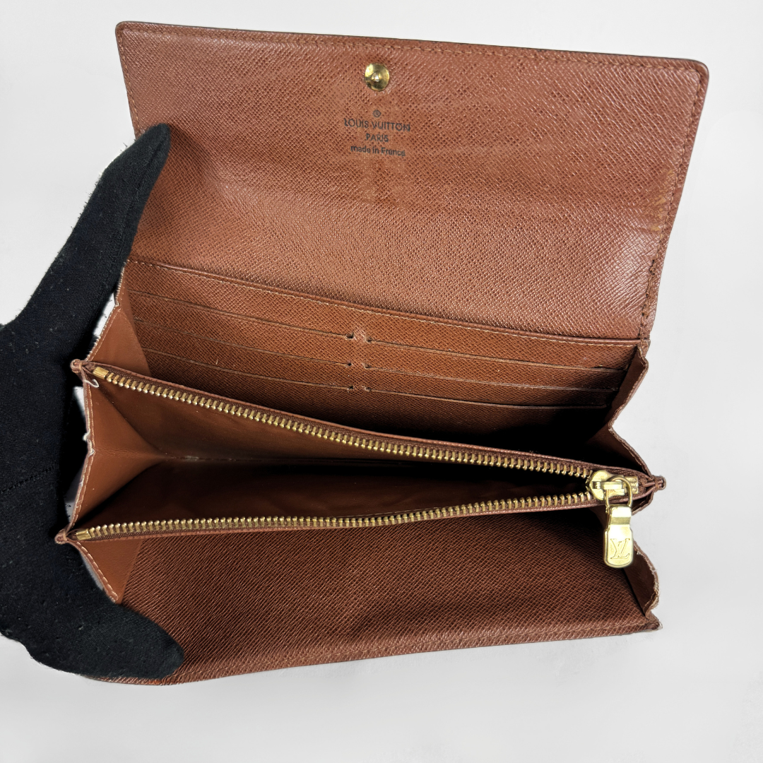 Louis Vuitton wallet on white background