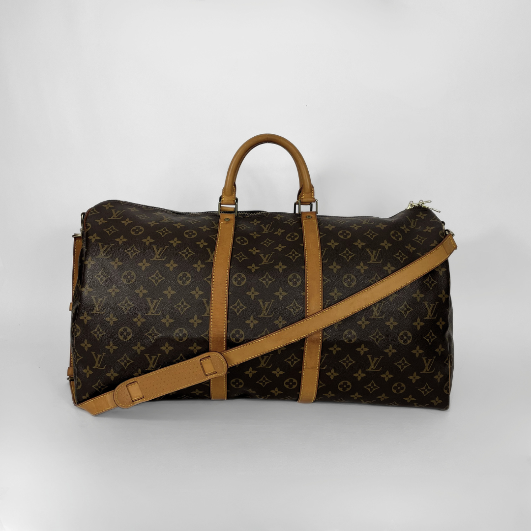 Louis Vuitton Keepall Strap 55 on a white background