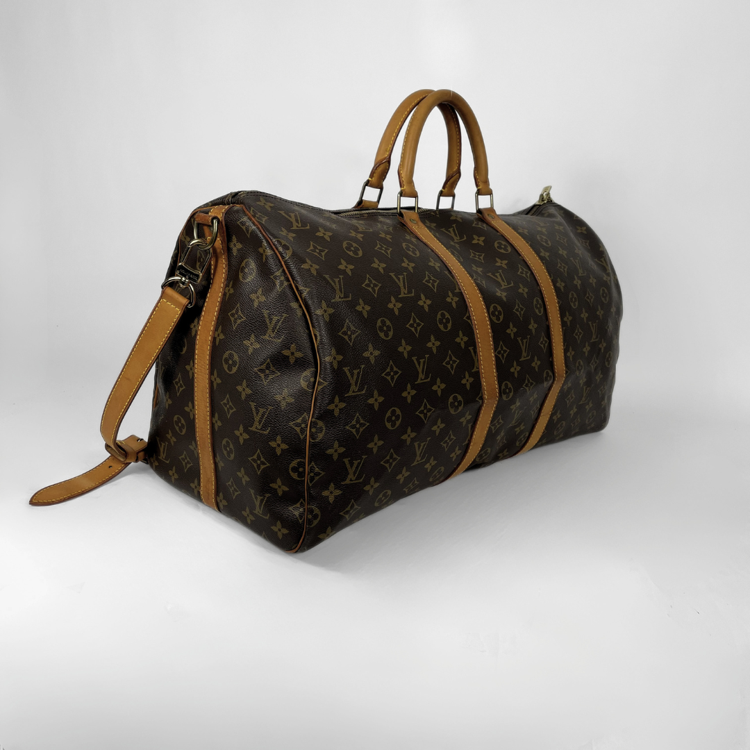 Louis Vuitton Keepall Strap 55 on a white background