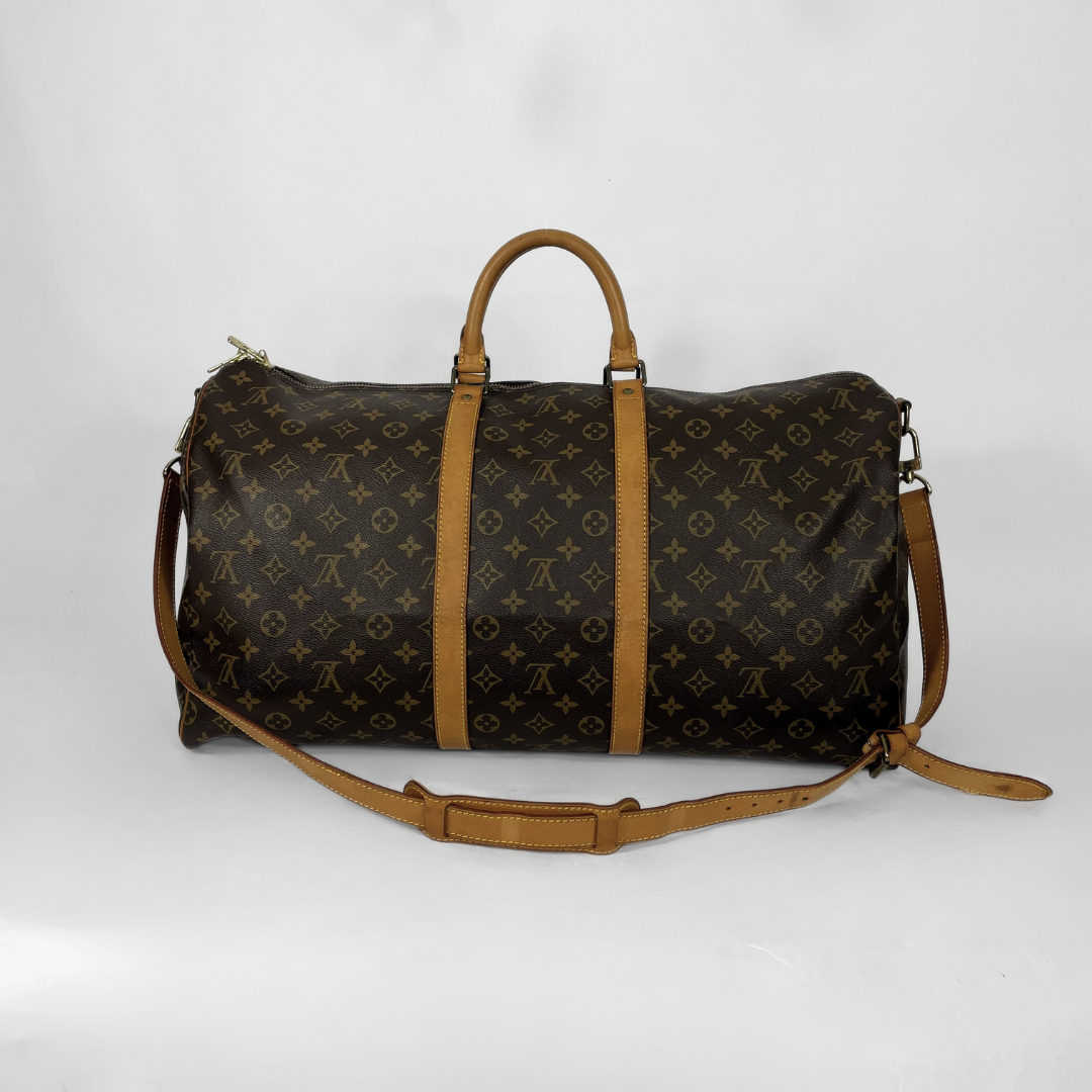 Louis Vuitton Keepall Strap 55 on a white background
