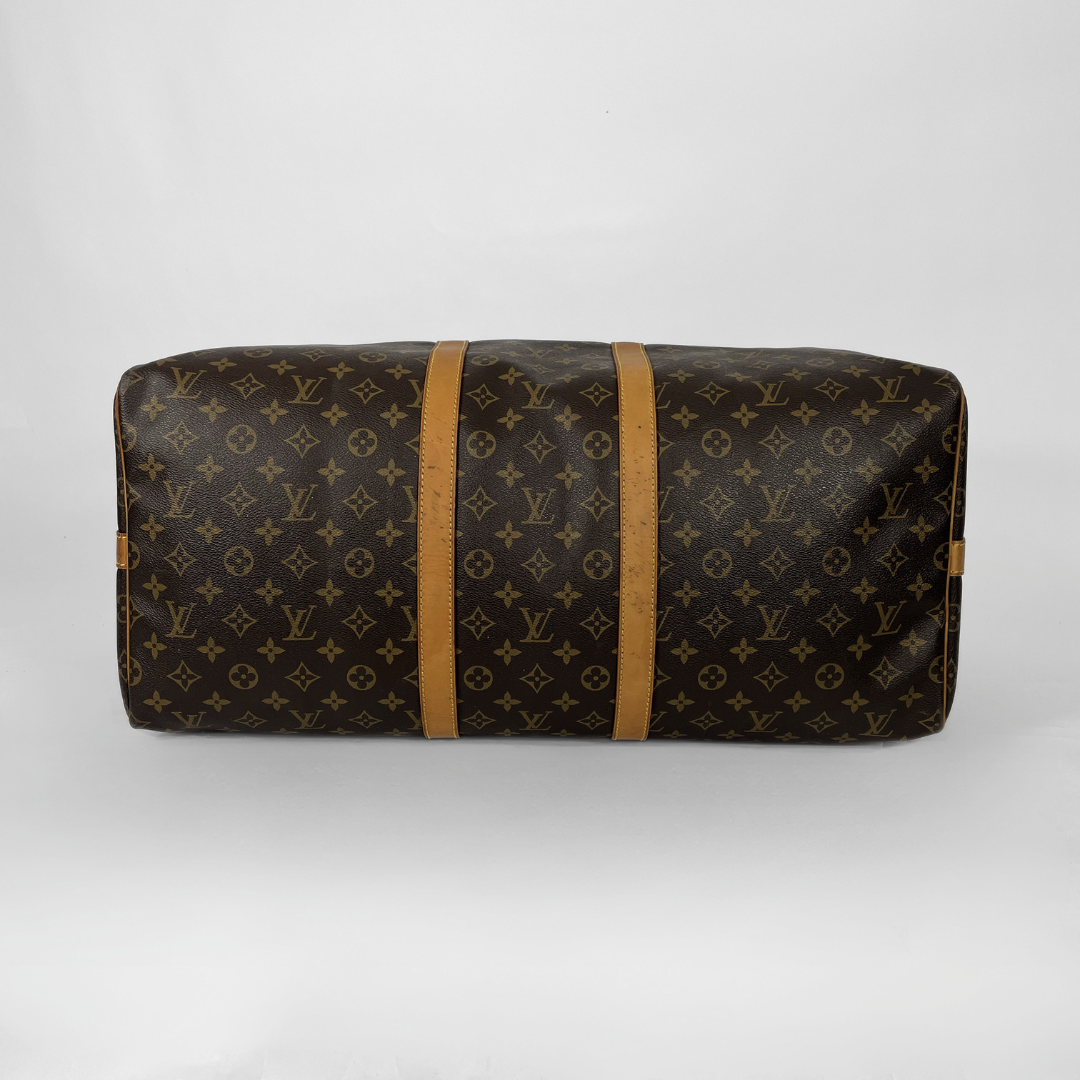 Louis Vuitton Keepall Strap 55 on a white background