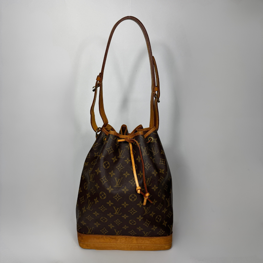 Louis Vuitton Petit Noe Monogram Canvas on a white background
