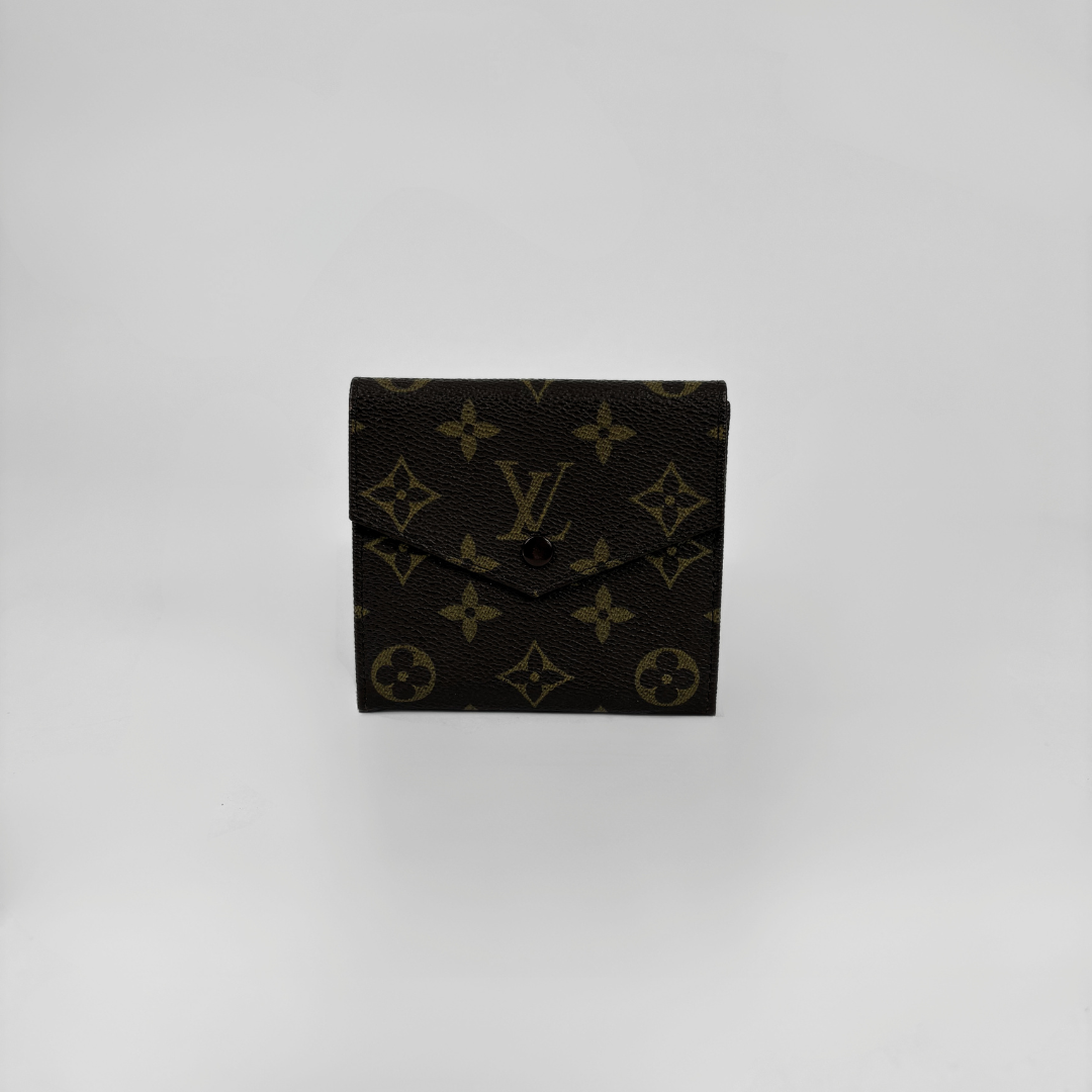 Louis Vuitton Druk Wallet on white background