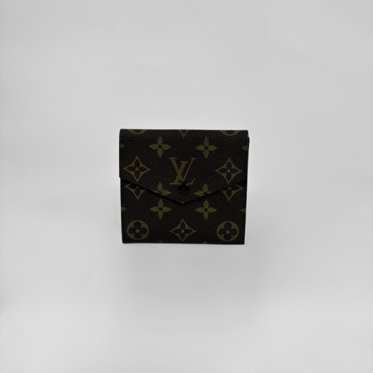 Louis Vuitton Druk Wallet on white background