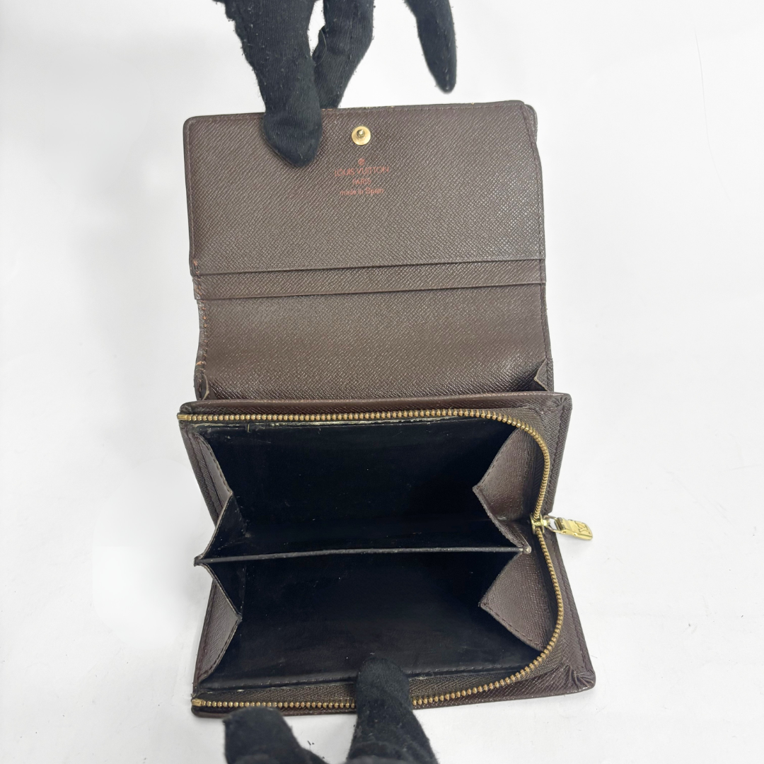 Brown checkered LV wallet with gold accents on a white background